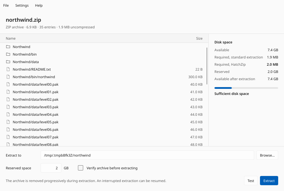 The HatchZip window with an archive open: the list of files on the left, and on the right the disk space it needs, compared with a standard extraction.